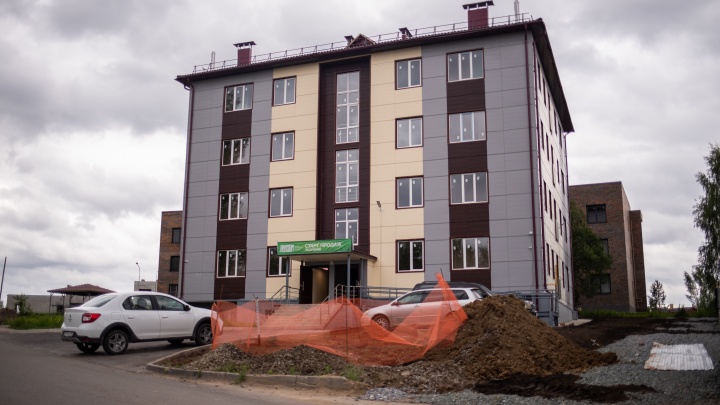 Показываем первую деревянную многоэтажку, которую построили в России. Сколько стоят квартиры в таком доме?