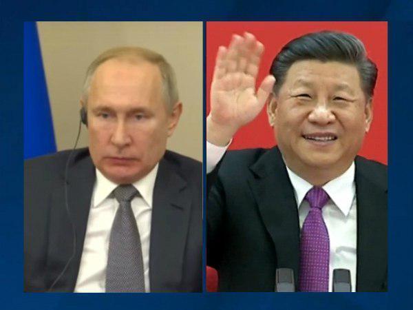 Владимир Путин и Синь Цзиньпин//кадр из трансляции/ТАСС