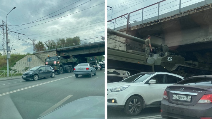 Собралась пробка: возле Академгородка военной машине спустили колеса, чтобы она проехала под мостом