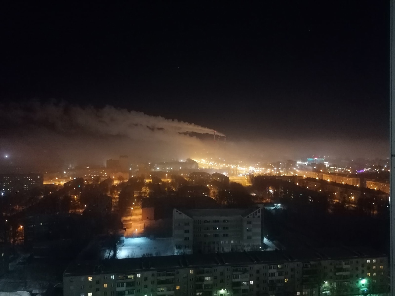 Панорама города и туман Панорама города и туман