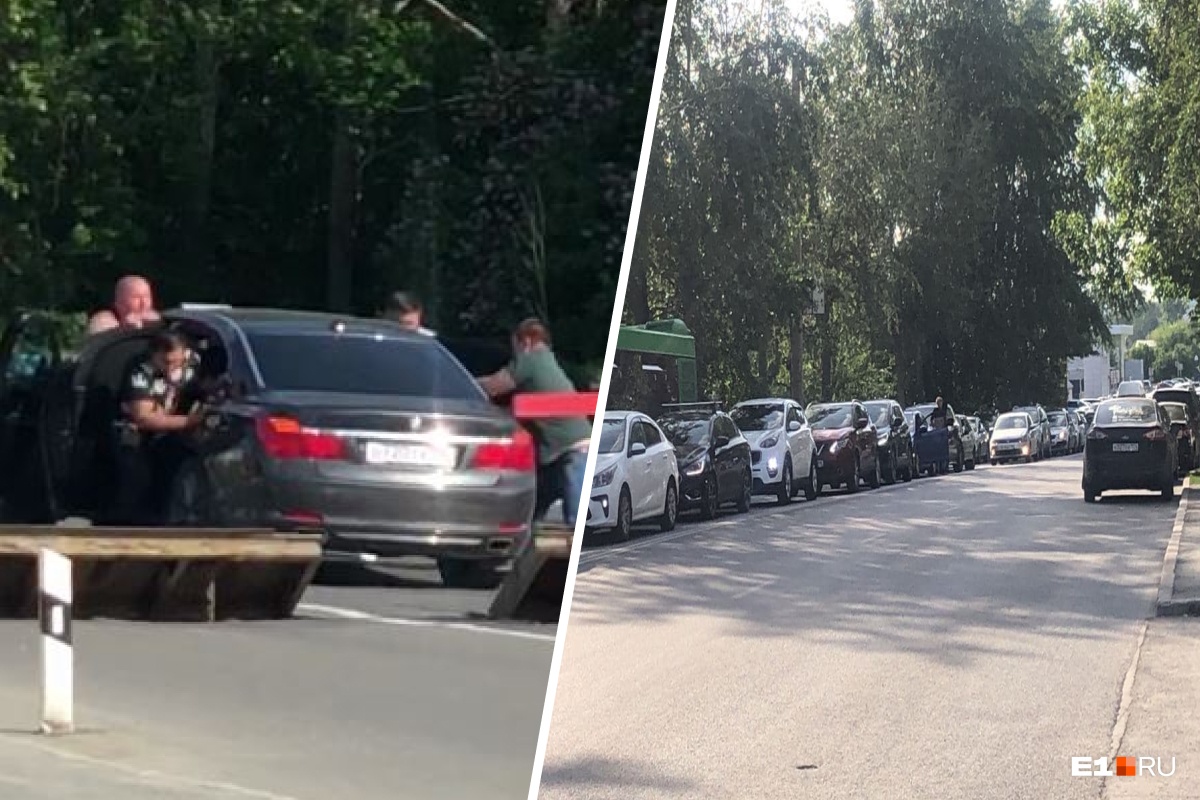 В Екатеринбурге десять мужиков вытолкали застрявшую на железнодорожных путях BMW