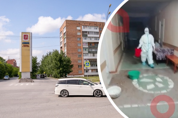 Медперсонал в СИЗах собирает воду в тазики Медперсонал в СИЗах собирает воду в тазики
