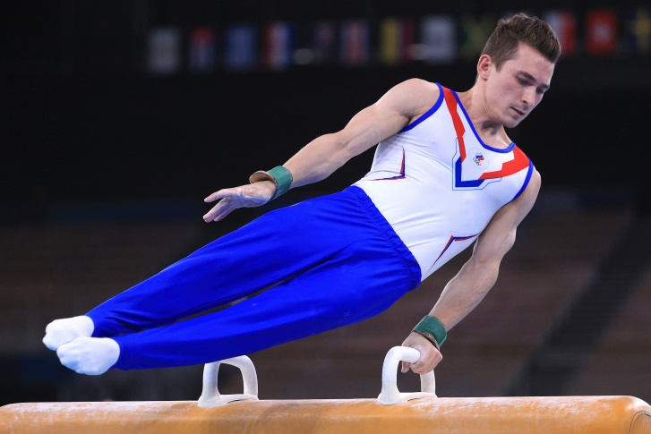 Гимнаст Давид Белявский во время финальных соревнований
