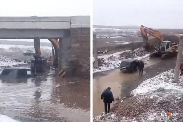 В луже заглохли как минимум пять автомобилей В луже заглохли как минимум пять автомобилей