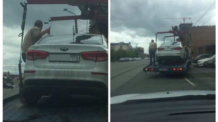 Владелец KIA Rio взобрался на эвакуатор. Смысла в этом немного Владелец KIA Rio взобрался на эвакуатор. Смысла в этом немного