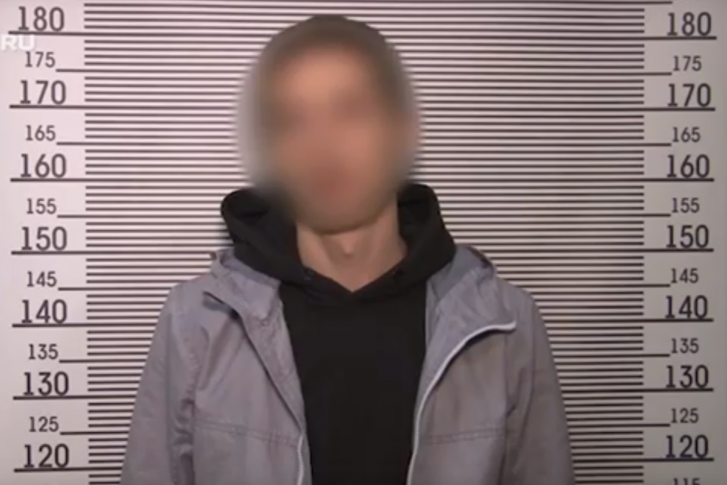 Кадр с видео допроса пьяного водителя Porsche